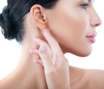 Dr Gerald N. Bock, MD California Skin & Laser Center Woman Touching Her Ears